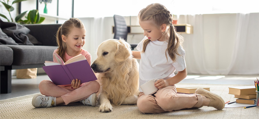 children reading to dogs